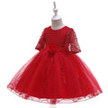 Red party dress for girls with net sleeves, floral waist, and sparkling tulle skirt – additional view