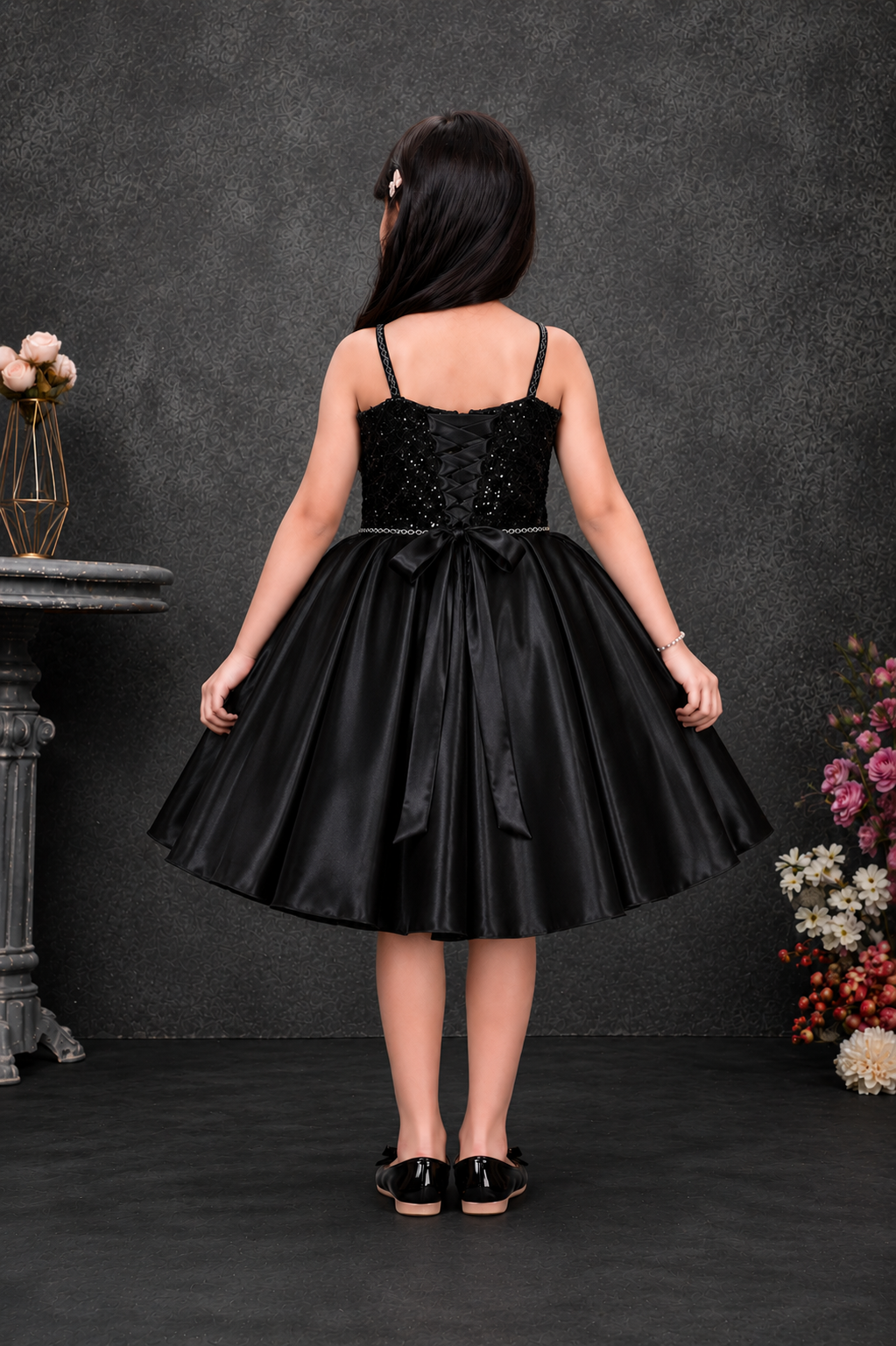 Girls black and fuchsia floral party dress back view