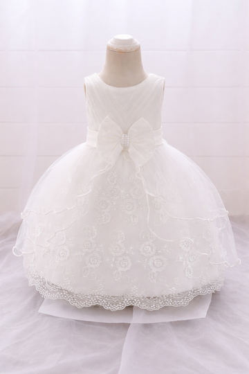 White floral embroidered baby frock with scalloped lace hem and pearl bow