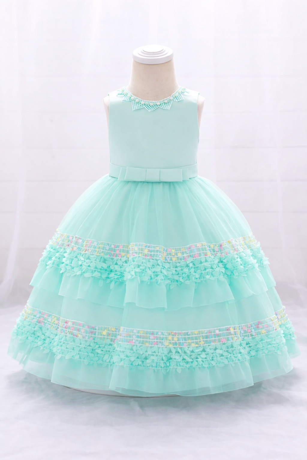 Mint green sleeveless tulle party gown for girls with floral lace and pearl neckline