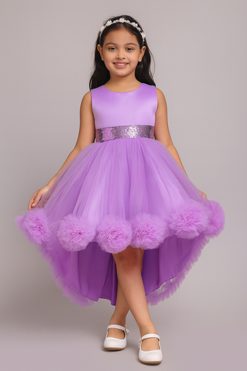Lilac puff tulle party frock for girls with sequin waist and pom-pom hemline