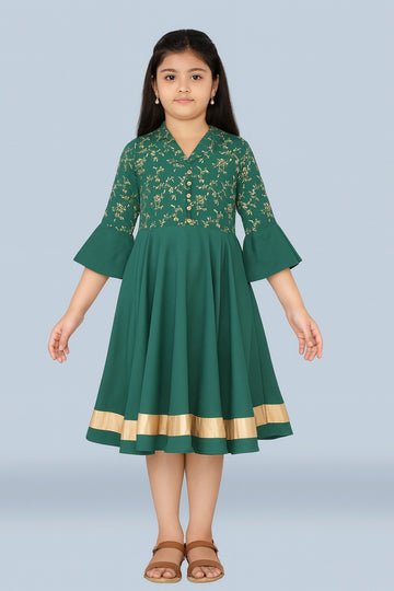 Green flared ethnic dress for girls with gold embroidery and border