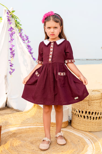 Maroon cotton casual dress for girls with white Peter Pan collar and embroidery