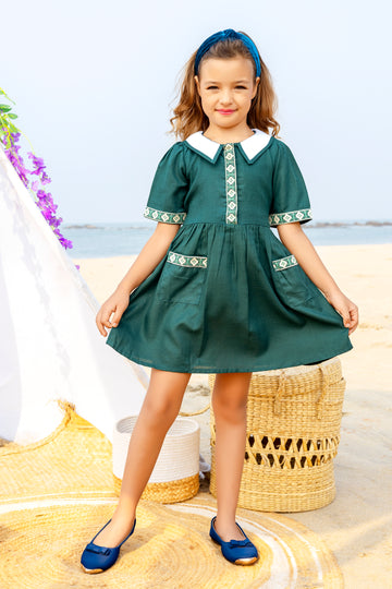 Vintage-Inspired Forest Green A-Line Cotton Dress for Girls with Embroidered Details, Peter Pan Collar & Front Pockets - Inayah Fashion