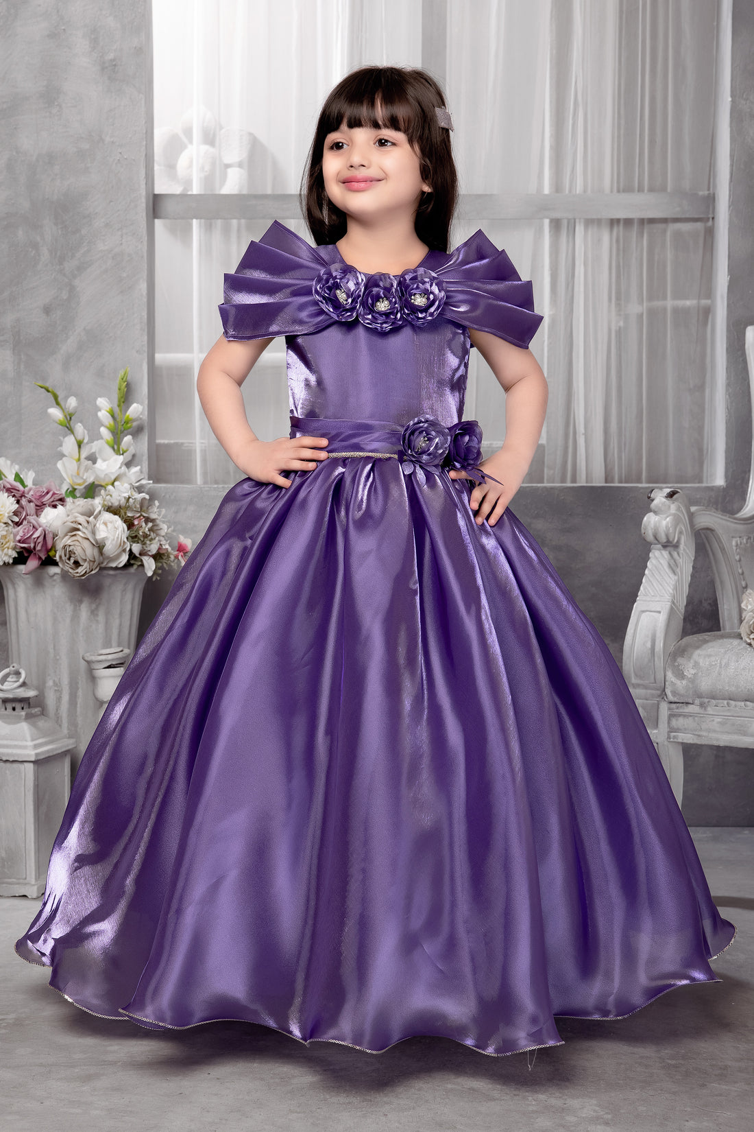 Purple satin floor-length party gown for girls with floral bow