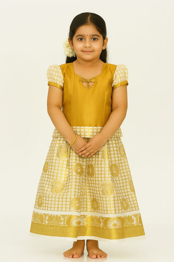 Traditional Golden Pattu Pavadai Set for Girls – Silk Blend Ethnic Wear with Checked Puff Sleeves & Floral Skirt Border – South Indian Festive Outfit - Inayah Fashion