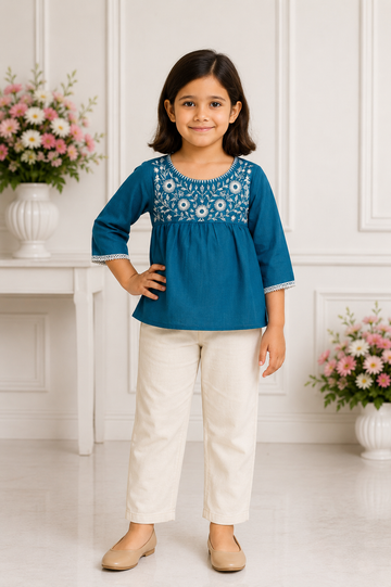 Teal blue embroidered cotton top with beige straight pants for girls
