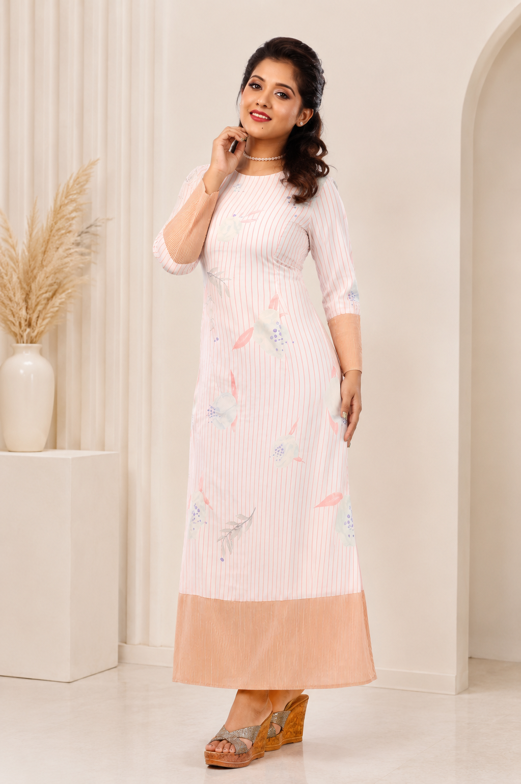 Peach full-length A-line dress for women with abstract floral print