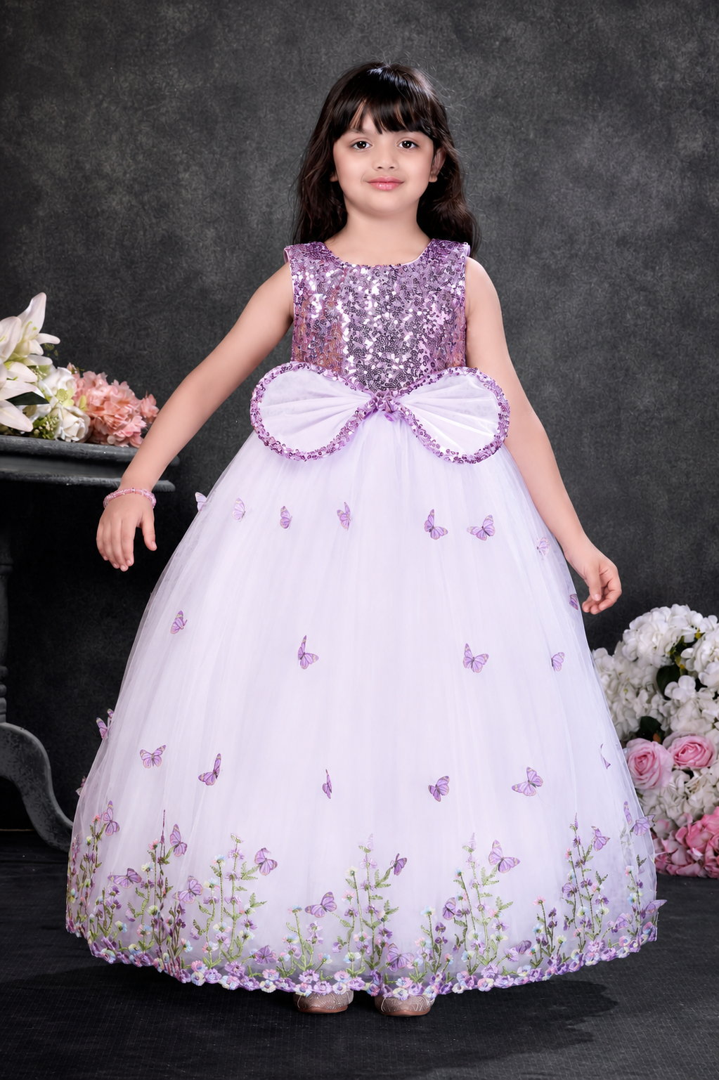 Girls lavender butterfly party gown with sequin bodice, statement bow and floral embroidery