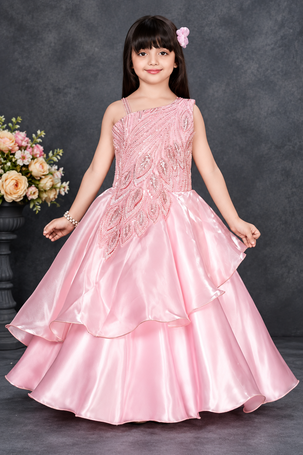 Pink embroidered layered party gown for girls