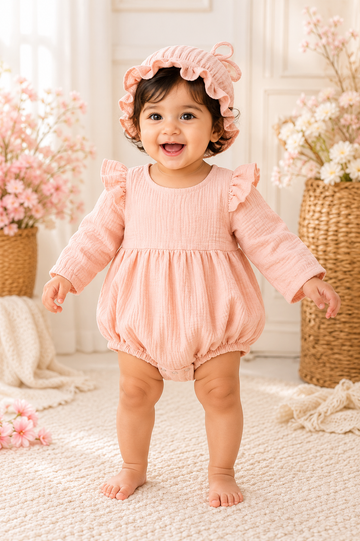 Peach long-sleeve baby romper with matching ruffle hat for girls