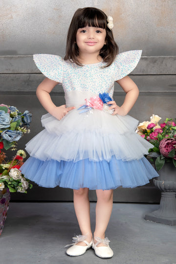 White & Blue Layered Net Party Dress for Girls – Sparkling Elegance with Floral Waist - Inayah Fashion