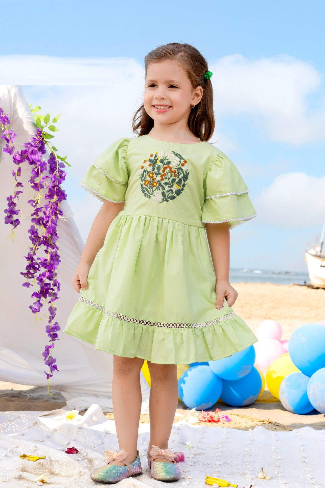 Green cotton frock for girls with floral embroidery