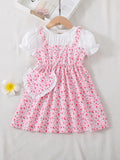 Pink tulip print frock for girls with white puff sleeves and heart sling bag – additional view