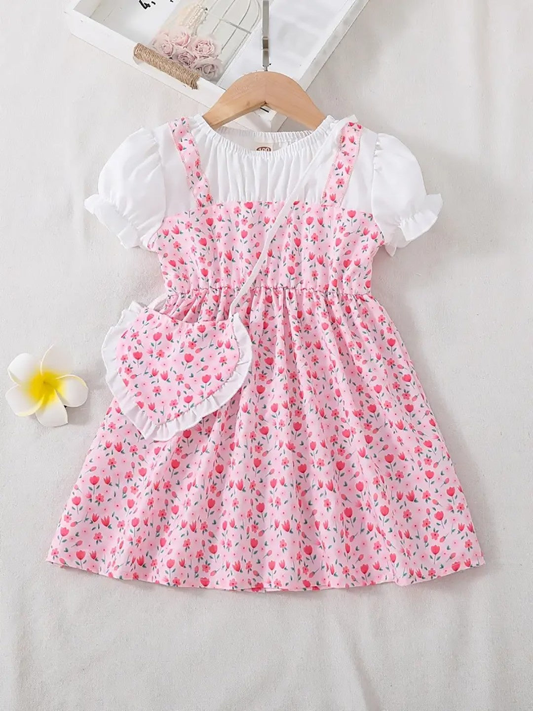 Pink tulip print frock for girls with white puff sleeves and heart sling bag – additional view