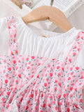 Pink tulip print frock for girls with white puff sleeves and heart sling bag – additional view