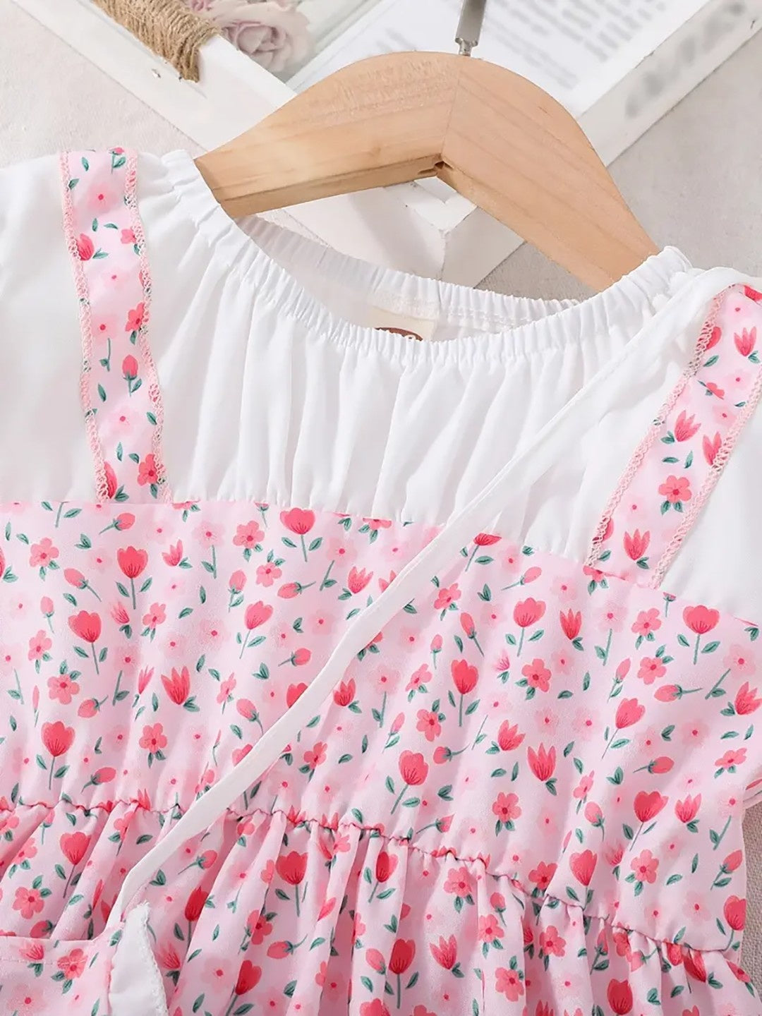 Pink tulip print frock for girls with white puff sleeves and heart sling bag – additional view
