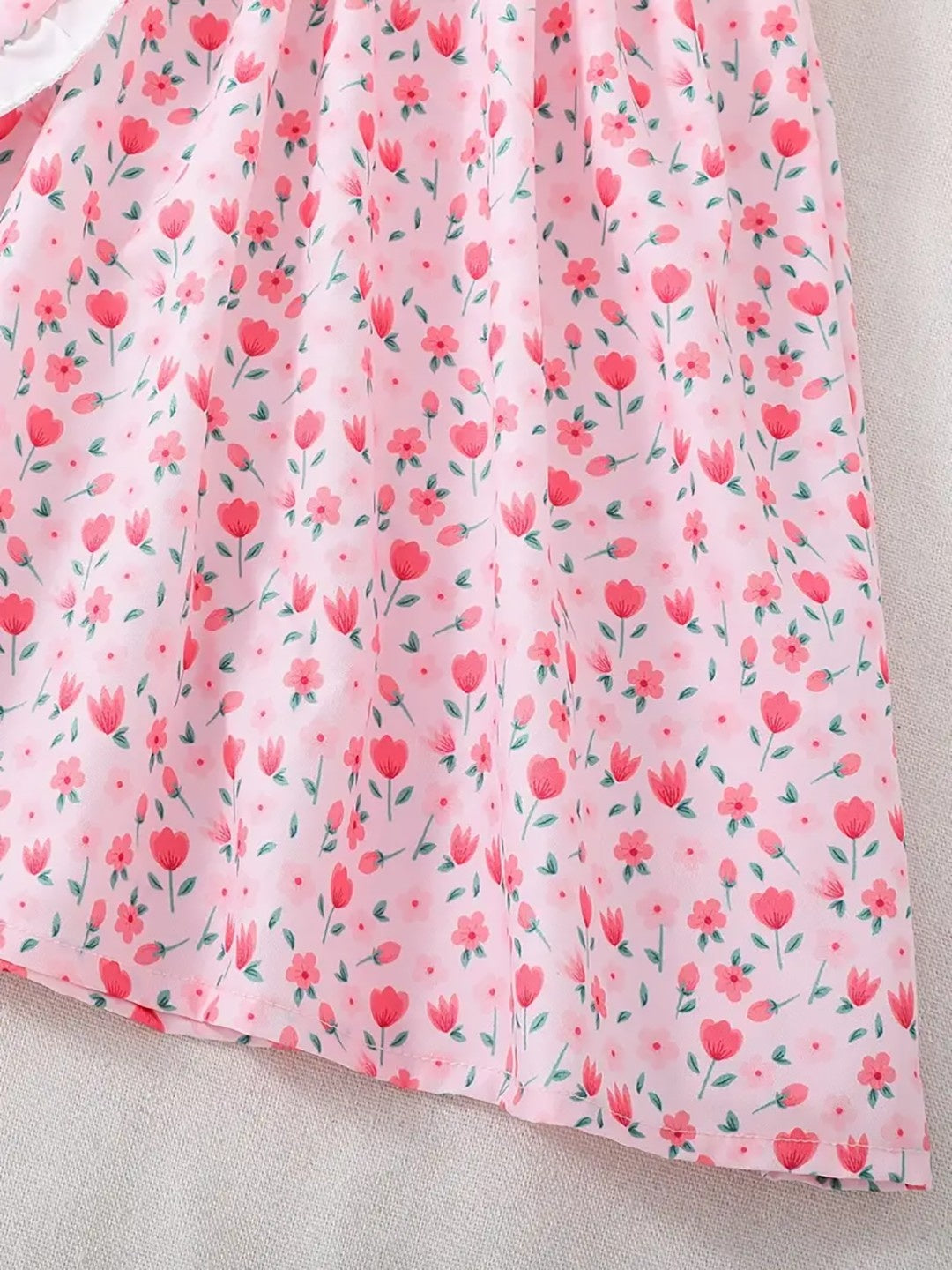 Pink tulip print frock for girls with white puff sleeves and heart sling bag – additional view