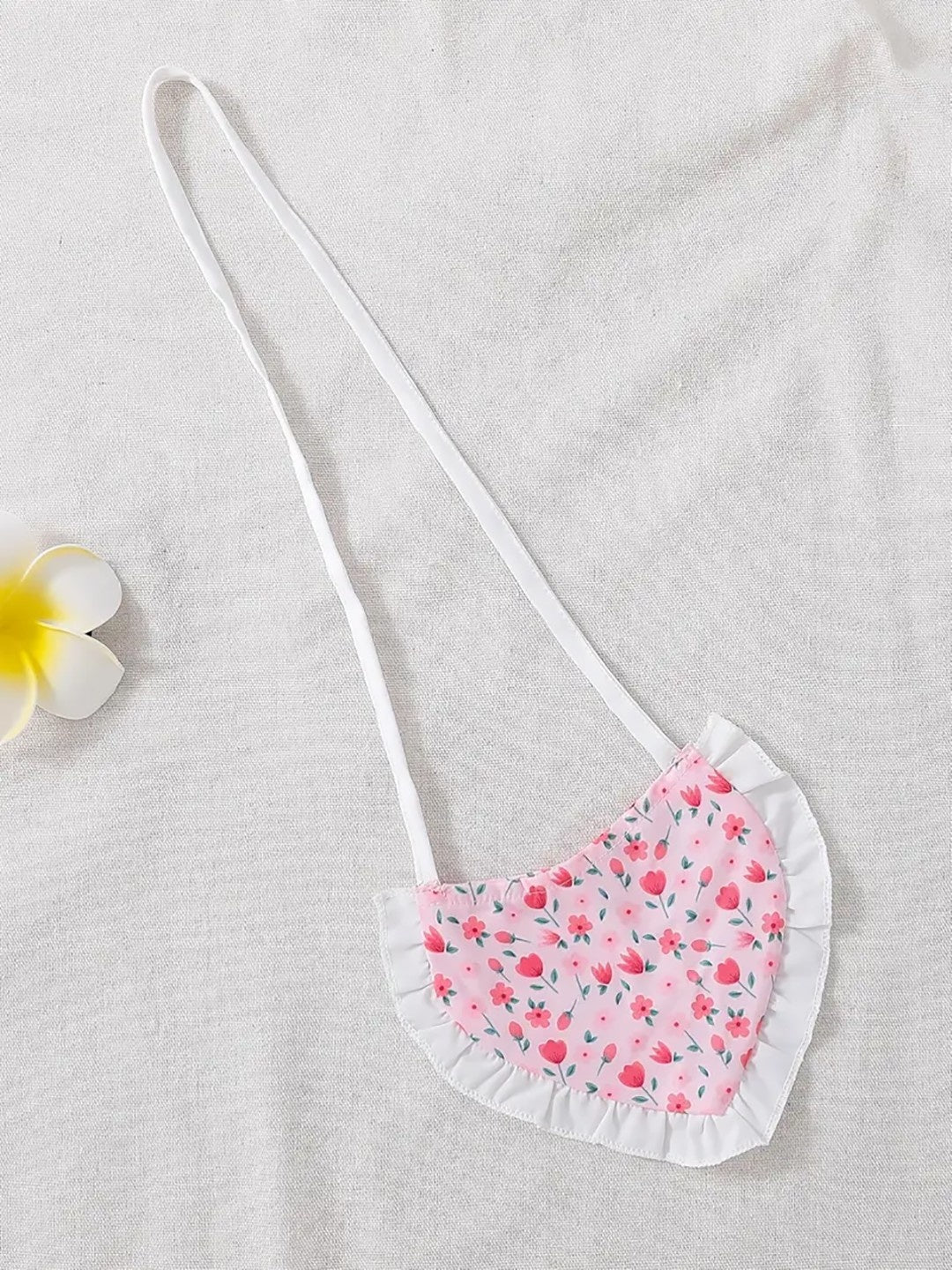 Pink tulip print frock for girls with white puff sleeves and heart sling bag – additional view