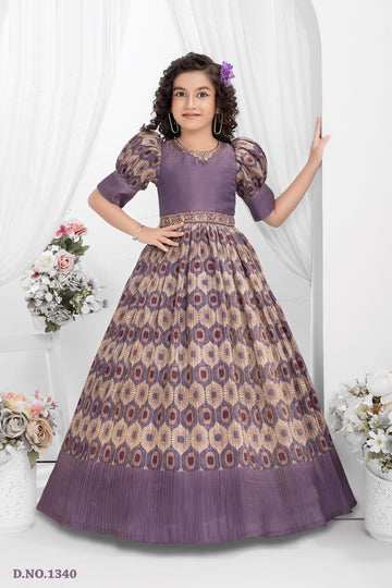 Purple brocade gown for girls with puff sleeves and gold zari weave